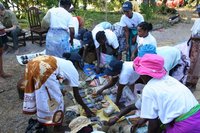 Villagers selling produce