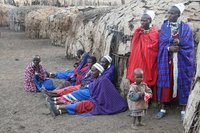 Maasai women and huts
