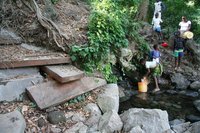 The source is covered by the slabs of stone to keep it clean. 