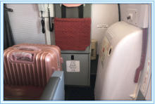 Suitcase blocking the emergency exit 