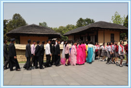 Long queue for a brief sighting of the birthplace of President Kim Il Sung
