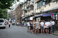 Playing Chinese Chequers in the street